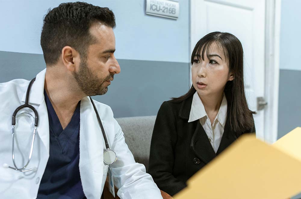 woman talking to a doctor