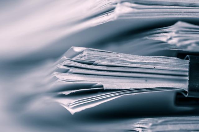 A stack of research papers